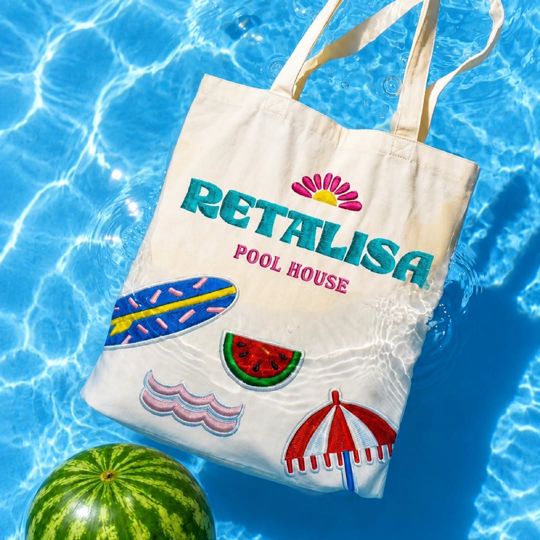 RETALISA tote bag resting on the water